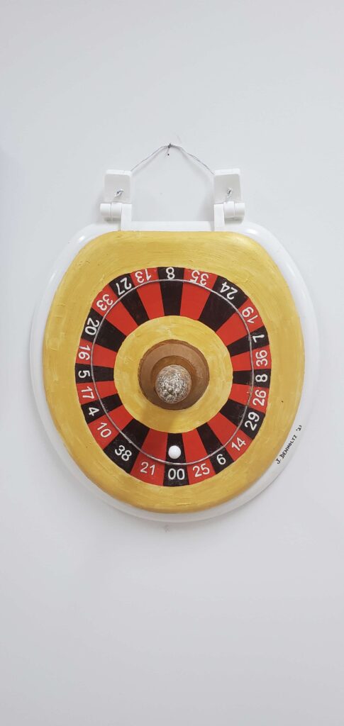Would you gamble by sitting on this toilet seat? 